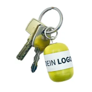 Erste-Hilfe Set als Streuartikel – ideal als Giveaway & personalisiertes Kundengeschenk – mit Logo bedrucken lassen mit gelb Kapsel als Schlüsselanhänger