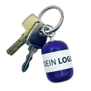 Erste-Hilfe Set als Streuartikel – ideal als Giveaway & personalisiertes Kundengeschenk – mit Logo bedrucken lassen mit lila Kapsel als Schlüsselanhänger