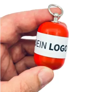 Erste-Hilfe Set als Streuartikel – ideal als Giveaway & personalisiertes Kundengeschenk – mit Logo bedrucken lassen mit rot Kapsel in Hand