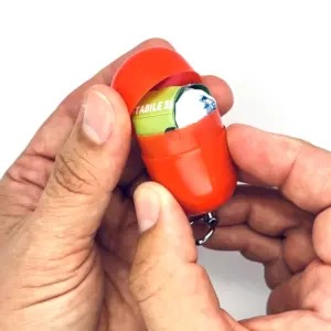 Erste-Hilfe Set als Streuartikel – ideal als Giveaway & personalisiertes Kundengeschenk – mit Logo bedrucken lassen mit rot Kapsel teilweise geöffnet