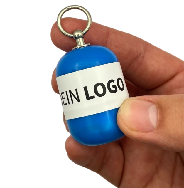 Erste-Hilfe Set als Streuartikel – ideal als Giveaway & personalisiertes Kundengeschenk – Notfallset mit Logo bedrucken lassen in blau in der Hand