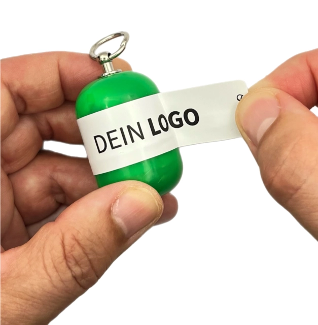 Erste-Hilfe Set als Streuartikel – ideal als Giveaway & personalisiertes Kundengeschenk – Notfallset mit Logo bedrucken lassen in grün beim öffnen